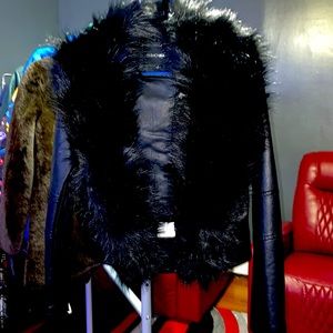 Black biker jacket with fur on neck brand new, never worn